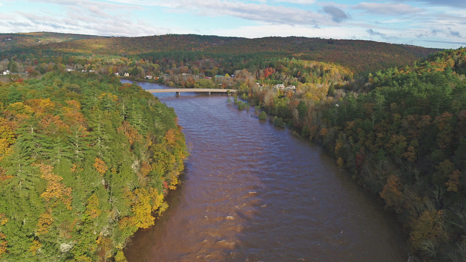 This is the Delaware River at Shohola Rapids; we’re looking upstream towards Barryville on the morning of October 27. The rocks are usually visible at Shohola Rapids, but they were covered by 17 feet of water when this photograph was taken. The gage upstream of here at Callicoon crested in the “moderate flood stage” (13.68 feet) and low-lying roads in that area were likely affected.